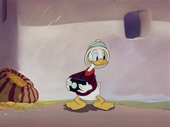 Movie still from “Saludos Amigos” (1942), directed by Jack Kinney – A painting of donald duck holding a camera in front of a wall; Medium shot, Low angle
