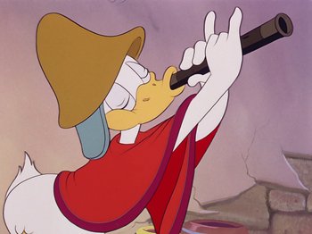Movie still from “Saludos Amigos” (1942), directed by Jack Kinney – A cartoon of a person holding a baseball bat in his hand; Close Up shot, Low angle