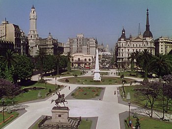 Movie still from “Saludos Amigos” (1942), directed by Jack Kinney – An aerial view of a park with a statue in the center; Extreme Wide shot, High angle