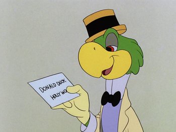 Movie still from “Saludos Amigos” (1942), directed by Jack Kinney – A cartoon of a bird wearing a top hat and holding a paper; Medium shot, Over the shoulder angle