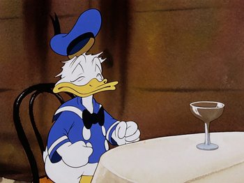 Movie still from “Saludos Amigos” (1942), directed by Jack Kinney – A painting of donald duck sitting at a dinner table; Medium shot, Over the shoulder angle