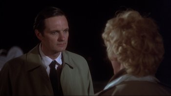 Movie still from “Same Time, Next Year” (1978), directed by Robert Mulligan – A man and a woman are talking to each other; Close Up shot, Over the shoulder angle