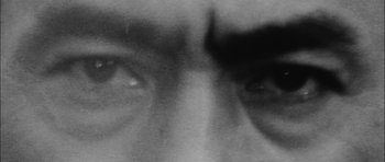 Movie still from “Samurai Rebellion” (1967), directed by Masaki Kobayashi – A black and white photo of a person's eyes; Extreme Close Up shot, High angle