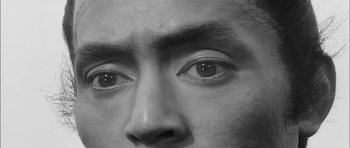 Movie still from “Samurai Rebellion” (1967), directed by Masaki Kobayashi – A man's eyes with a strange look on his face; Extreme Close Up shot, High angle