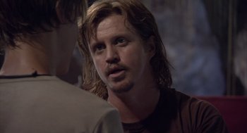 Movie still from “Sanctum” (2011), directed by Alister Grierson – A person with long brown hair; Close Up shot, Over the shoulder angle