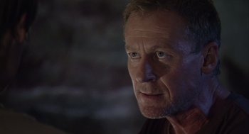 Movie still from “Sanctum” (2011), directed by Alister Grierson – A person looking at the camera; Close Up shot, Over the shoulder angle