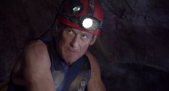 Movie still from “Sanctum” (2011), directed by Alister Grierson – A person with a helmet on; Close Up shot, Low angle