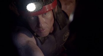Movie still from “Sanctum” (2011), directed by Alister Grierson – A person with a helmet on; Close Up shot, Low angle