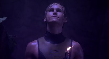 Movie still from “Sanctum” (2011), directed by Alister Grierson – A man in a black shirt is looking up; Close Up shot, Low angle