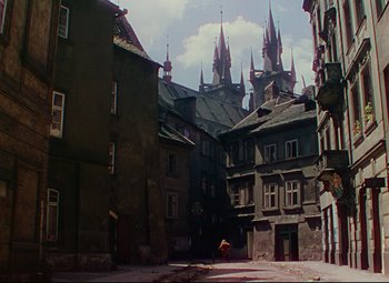 Movie still from “Saraband” (1948), directed by Basil Dearden – An image of an old european city street; Extreme Wide shot, High angle