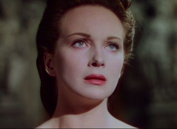 Movie still from “Saraband” (1948), directed by Basil Dearden – A beautiful woman with red lipstick looking to her left; Close Up shot, Low angle