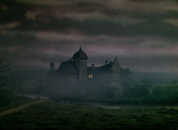 Movie still from “Saraband” (1948), directed by Basil Dearden – A large house in the middle of the night; Extreme Wide shot, Low angle