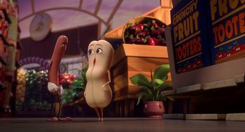 Movie still from “Sausage Party” (2016), directed by Greg Tiernan – Two animated characters stand next to each other in front of an apple crate; Wide shot, Over the shoulder angle
