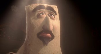 Movie still from “Sausage Party” (2016), directed by Greg Tiernan – A burrito with a man's face on top of it; Extreme Close Up shot, Low angle