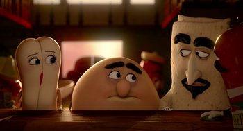 Movie still from “Sausage Party” (2016), directed by Greg Tiernan – A cake on top of a table; Close Up shot, Over the shoulder angle