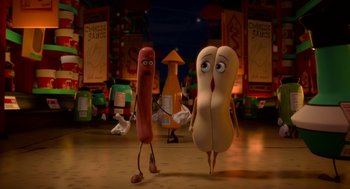 Movie still from “Sausage Party” (2016), directed by Greg Tiernan – A couple of hot dogs walking across a floor; Medium shot, Low angle