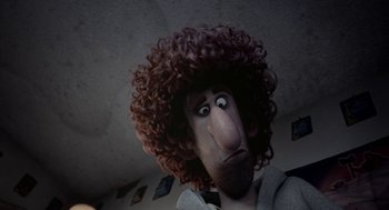 Movie still from “Sausage Party” (2016), directed by Greg Tiernan – A man wearing a wig and a beard; Close Up shot, Low angle