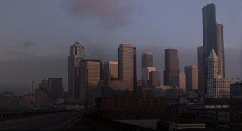 Movie still from “Say Anything” (1989), directed by Cameron Crowe – A view of a city skyline at sunset; Extreme Wide shot, High angle