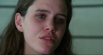 Movie still from “Say Anything” (1989), directed by Cameron Crowe – A woman's face with green eyes; Close Up shot, Over the shoulder angle