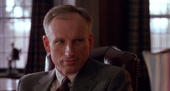 Movie still from “Scent of a Woman” (1992), directed by Martin Brest – A person wearing a suit and tie; Close Up shot, Low angle