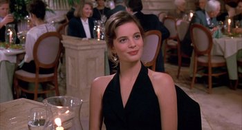 Movie still from “Scent of a Woman” (1992), directed by Martin Brest – A beautiful young lady sitting at a dinner table; Close Up shot, Over the shoulder angle