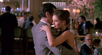 Movie still from “Scent of a Woman” (1992), directed by Martin Brest – A man and a woman are dancing in a restaurant; Medium shot, Over the shoulder angle