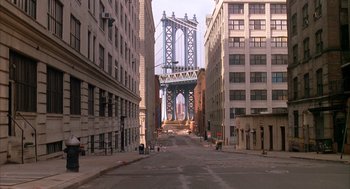 Movie still from “Scent of a Woman” (1992), directed by Martin Brest – A view of a bridge in the middle of a city; Extreme Wide shot, High angle