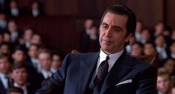 Movie still from “Scent of a Woman” (1992), directed by Martin Brest – A person wearing a suit and tie; Close Up shot, Low angle