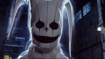 Movie still from “Scooby-Doo” (2002), directed by Raja Gosnell – A person wearing a bunny mask with a smile on their face; Close Up shot, Low angle