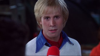 Movie still from “Scooby-Doo” (2002), directed by Raja Gosnell – A person holding a microphone; Close Up shot, Low angle