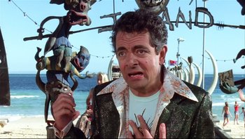 Movie still from “Scooby-Doo” (2002), directed by Raja Gosnell – A man in a green jacket is looking at the camera; Close Up shot, Low angle