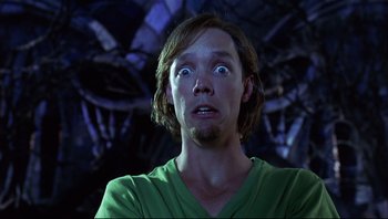 Movie still from “Scooby-Doo” (2002), directed by Raja Gosnell – A man with a surprised look on his face; Close Up shot, Low angle