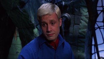 Movie still from “Scooby-Doo” (2002), directed by Raja Gosnell – A man with blonde hair and a blue shirt; Close Up shot, High angle