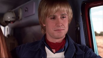 Movie still from “Scooby-Doo” (2002), directed by Raja Gosnell – A person wearing a neck scarf; Close Up shot, Low angle