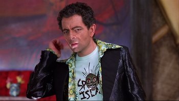 Movie still from “Scooby-Doo” (2002), directed by Raja Gosnell – A man in a black jacket and a white shirt; Close Up shot, Over the shoulder angle
