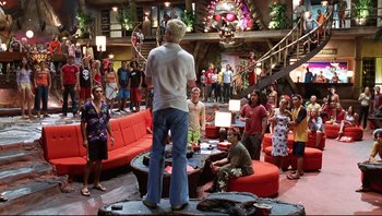 Movie still from “Scooby-Doo” (2002), directed by Raja Gosnell – A group of people gathered in a living room; Wide shot, High angle