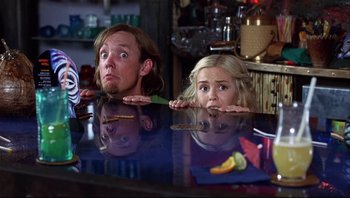 Movie still from “Scooby-Doo” (2002), directed by Raja Gosnell – A man and a woman are looking at the camera; Medium shot, Low angle