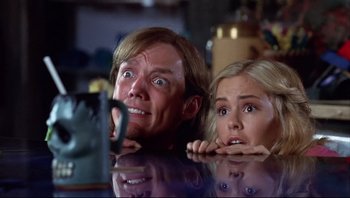 Movie still from “Scooby-Doo” (2002), directed by Raja Gosnell – A man and a woman looking at a mirror; Close Up shot, Low angle