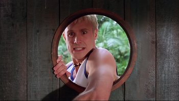 Movie still from “Scooby-Doo” (2002), directed by Raja Gosnell – A man is looking into a round mirror; Close Up shot, Low angle