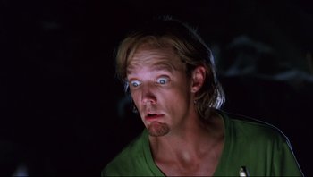 Movie still from “Scooby-Doo” (2002), directed by Raja Gosnell – A person with green eyes; Close Up shot, Low angle