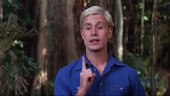 Movie still from “Scooby-Doo” (2002), directed by Raja Gosnell – A man in a blue shirt is pointing to his face; Close Up shot, Low angle