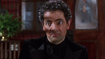 Movie still from “Scooby-Doo” (2002), directed by Raja Gosnell – A person wearing a suit and tie; Close Up shot, Low angle