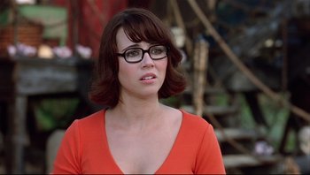Movie still from “Scooby-Doo” (2002), directed by Raja Gosnell – A woman wearing glasses and a red shirt; Close Up shot, Over the shoulder angle