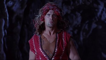 Movie still from “Scooby-Doo” (2002), directed by Raja Gosnell – A man in a red shirt and a red hat; Medium shot, Low angle