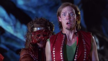 Movie still from “Scooby-Doo” (2002), directed by Raja Gosnell – A man and a woman wearing masks in front of each other; Close Up shot, Low angle