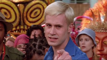 Movie still from “Scooby-Doo” (2002), directed by Raja Gosnell – A man with blonde hair and a blue shirt; Close Up shot, Low angle