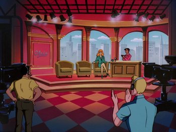 Movie still from “Scooby-Doo on Zombie Island” (1998), directed by Jim Stenstrum – A cartoon of a room that has people sitting in it; Wide shot, Over the shoulder angle