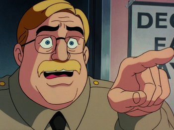Movie still from “Scooby-Doo on Zombie Island” (1998), directed by Jim Stenstrum – An animated picture of a man in a uniform pointing; Close Up shot, Low angle