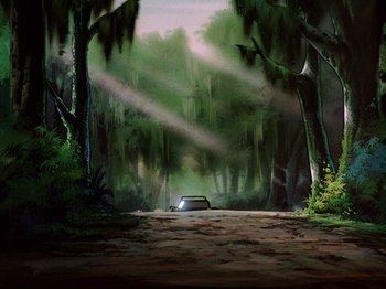 Movie still from “Scooby-Doo on Zombie Island” (1998), directed by Jim Stenstrum – A car parked in the middle of the road in the woods; Extreme Wide shot, Low angle