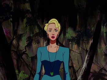 Movie still from “Scooby-Doo on Zombie Island” (1998), directed by Jim Stenstrum – A woman with blonde hair wearing a blue dress; Medium shot, Over the shoulder angle